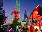 A Santa Clause's statue is being installed at the entrance of St Basilica Church ahead of the Christmas festival, at Shivaji Nagar in Bengaluru, Monday, Dec. 20, 2021. (PTI Photo/Shailendra Bhojak)