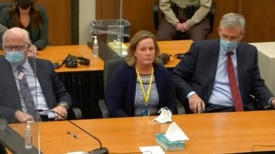 Former Brooklyn Center police Officer Kim Potter (center) was convicted of two manslaughter charges in the killing of Daunte Wright, a Black motorist she shot during a traffic stop after she said she confused her gun for her Taser. (AP) Former Brooklyn Center police Officer Kim Potter (center) was convicted of two manslaughter charges in the killing of Daunte Wright, a Black motorist she shot during a traffic stop after she said she confused her gun for her Taser. (AP)