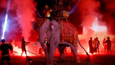 Artists perform with an elephant in an ancient war re-enactment during the Ayutthaya World Heritage Fair to mark the 30th anniversary of UNESCO recognizing the ancient city as a World Heritage site, in Ayutthaya, Thailand (REUTERS) Artists perform with an elephant in an ancient war re-enactment during the Ayutthaya World Heritage Fair to mark the 30th anniversary of UNESCO recognizing the ancient city as a World Heritage site, in Ayutthaya, Thailand (REUTERS)