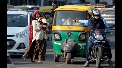 Adults with children begging for alms from motorists on streets is a common sight in Chandigarh tricity area. (Ravi Kumar/ HT photo) Adults with children begging for alms from motorists on streets is a common sight in Chandigarh tricity area. (Ravi Kumar/ HT photo)