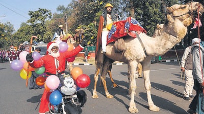 Members of the Christian community taking part in the Christmas Shobha Yatra at Sector 18 in Chandigarh on Thursday. (Keshav Singh/HT) Members of the Christian community taking part in the Christmas Shobha Yatra at Sector 18 in Chandigarh on Thursday. (Keshav Singh/HT)