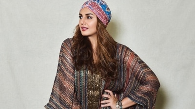 Flaunting her well-toned legs, Huma completed her attire with a pair of black pointed-toe heels from Christian Louboutin. She left her luscious tresses open down her shoulders and wore a multi-coloured turban for the ultimate Bohemian vibe. (Amigos Communications)