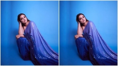 Parineeti played muse to fashion designer Manish Malhotra and picked a blue and silver shimmery saree. (Instagram/@parineetichopra)