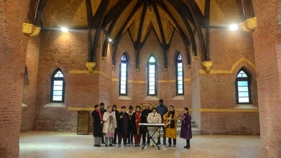 Christians offer prayers inside the Saint Lukes church in Srinagar, which opened for public on Thursday. (PTI Photo)