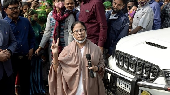 West Bengal Chief Minister Mamata Banerjee flashes a victory sign at a celebration after TMC's victory in the Kolkata Municipal Corporation (KMC) elections at her residence in Kolkata (ANI)