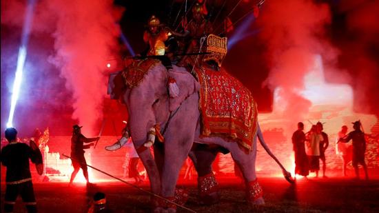 Artists perform with an elephant in an ancient war re-enactment during the Ayutthaya World Heritage Fair to mark the 30th anniversary of UNESCO recognizing the ancient city as a World Heritage site, in Ayutthaya, Thailand (REUTERS)