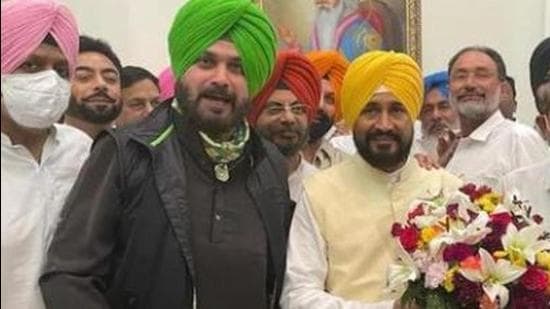 Punjab chief minister Charanjit Singh Channi (right) and state Congress chief Navjot Singh Sidhu attended the screening committee meeting, chaired by party national general secretary Ajay Maken, in New Delhi on Wednesday night. (HT file photo)