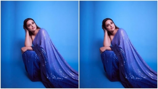 Parineeti played muse to fashion designer Manish Malhotra and picked a blue and silver shimmery saree.(Instagram/@parineetichopra)