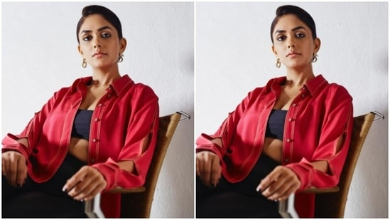 Styled by Rajul Vijay, Mrunal wore her tresses into a bun and opted for a minimal makeup look. She decked up in nude eyeshadow, black eyeliner, mascara-laden eyelashes, black kohl, contoured cheeks and a shade of nude lipstick, and was fashion-ready.(Instagram/@mrunalthakur)