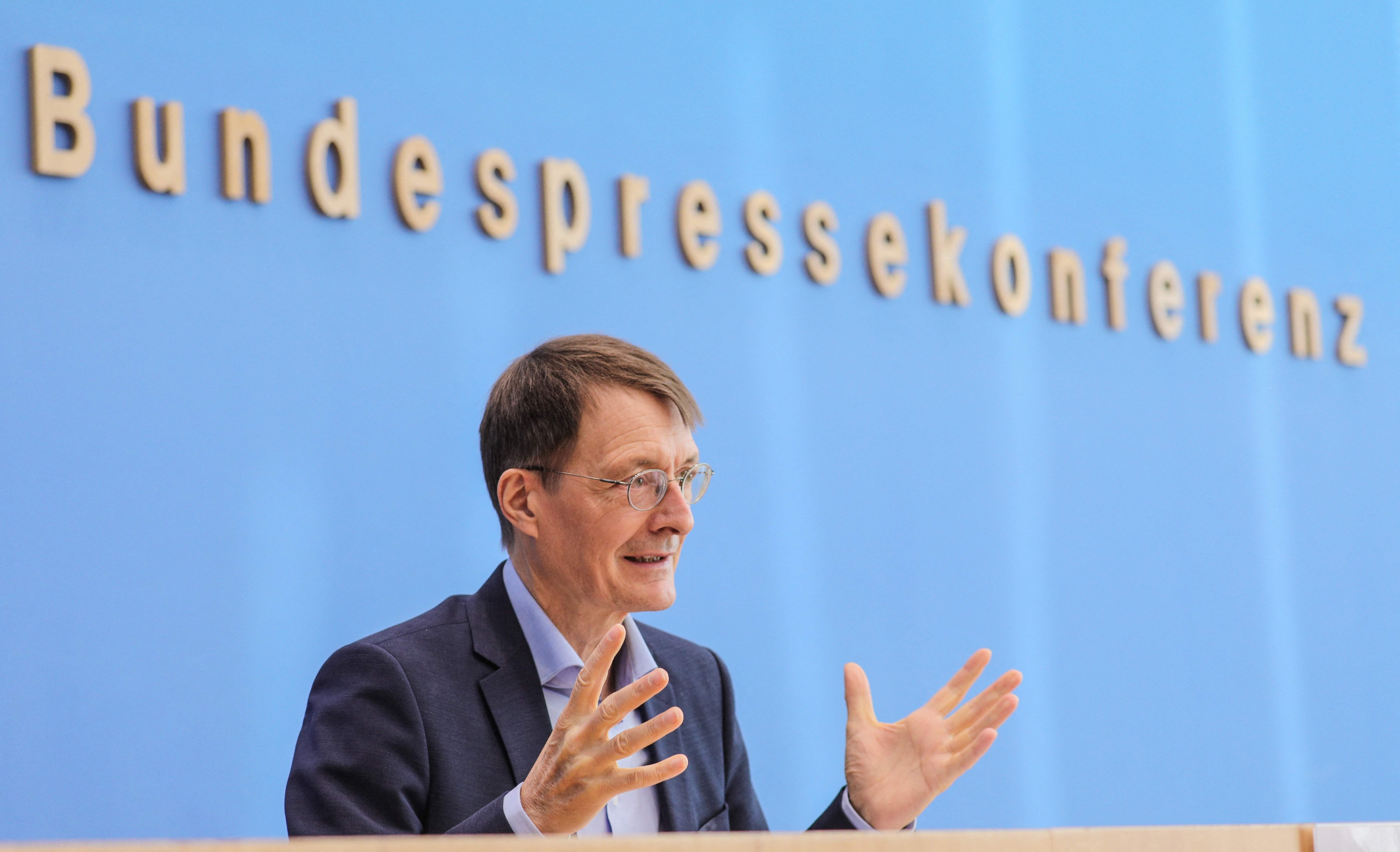 German health minister Karl Lauterbach addresses a press conference on the situation of Covid-19 pandemic in Berlin on December 22, 2021.&nbsp; (AFP)