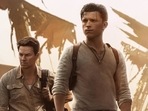 Tom Holland and Mark Wahlberg in Uncharted. Tom Holland and Mark Wahlberg in Uncharted.