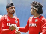 Harbhajan Singh with Sreesanth.