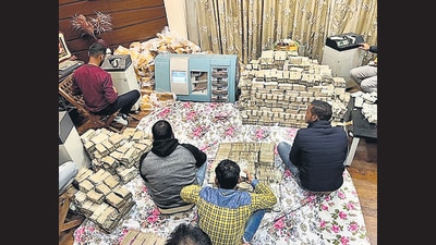 I-T sleuths during the raid at businessman Piyush Jain's residence, in Kanpur on Friday. (ANI) I-T sleuths during the raid at businessman Piyush Jain's residence, in Kanpur on Friday. (ANI)