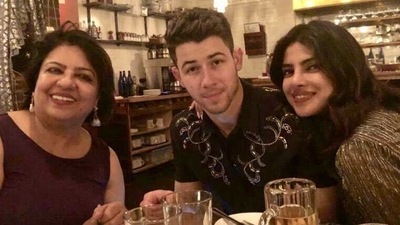 Priyanka Chopra with husband Nick Jonas and mother Dr Madhu Chopra. Priyanka Chopra with husband Nick Jonas and mother Dr Madhu Chopra.