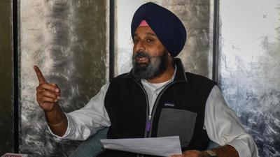 Senior Shiromani Akali Dal (SAD) leader Bikram Singh Majithia speaks during a press conference in Amritsar on November 23. (AFP)