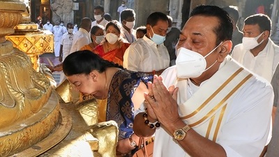 Sri Lankan Prime Minister Mahinda Rajapaksa with his wife Shiranthi offer worship at Lord Venkateswara Swamy temple at Tirumala in Tirupati (PTI Photo) (PTI) Sri Lankan Prime Minister Mahinda Rajapaksa with his wife Shiranthi offer worship at Lord Venkateswara Swamy temple at Tirumala in Tirupati (PTI Photo) (PTI)