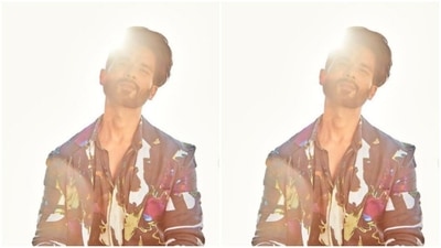 Shahid teamed a black shirt with splashes of multiple colours with a blazer and a pair of trousers of the same print. (Instagram/@shahidkapoor)