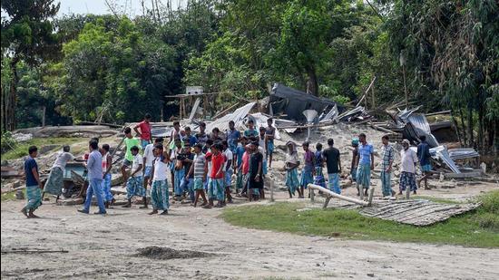 Since most of the evicted families were Bengali-speaking Muslims, it was alleged that they are illegal immigrants who had forcibly occupied government land as well as land of indigenous people and also settled on grazing land. (PTI PHOTO.) Since most of the evicted families were Bengali-speaking Muslims, it was alleged that they are illegal immigrants who had forcibly occupied government land as well as land of indigenous people and also settled on grazing land. (PTI PHOTO.)