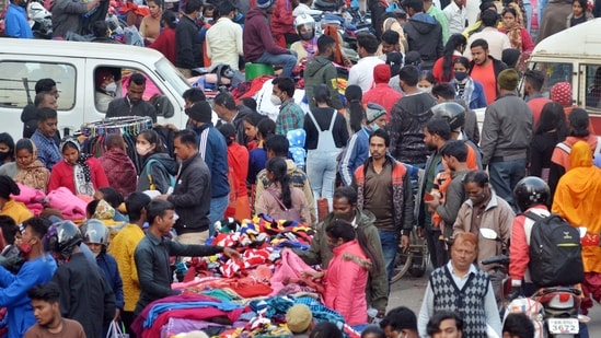 People visit a crowded market on Christmas eve amid concerns over Omicron-driven third wave, in Ranchi on Friday.
