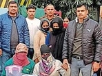The suspects (faces covered) in police custody.(Sourced) The suspects (faces covered) in police custody.(Sourced)
