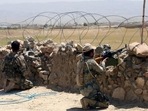 Afghan police personnel keep watch near the Durand Line. Afghan police personnel keep watch near the Durand Line.