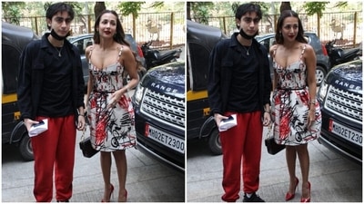 Malaika's son Arhaan accompanied his mother wearing a solid black t-shirt, red joggers with gathered hem, and a black denim jacket. A sleek silver chain, black lace-up sneakers, black face mask, and bracelets rounded up his look for the Christmas lunch. (HT Photo/Varinder Chawla) Malaika's son Arhaan accompanied his mother wearing a solid black t-shirt, red joggers with gathered hem, and a black denim jacket. A sleek silver chain, black lace-up sneakers, black face mask, and bracelets rounded up his look for the Christmas lunch. (HT Photo/Varinder Chawla)