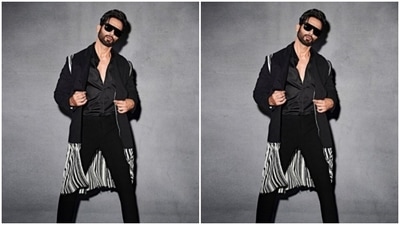 Shahid decked up in a black silk shirt and a black pair of trousers. He layered his look with a long shrug. (Instagram/@shahidkapoor)