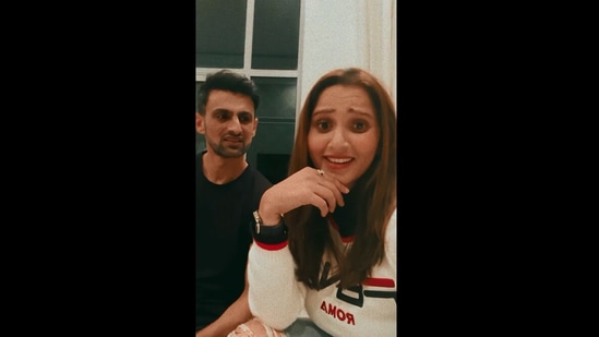 The image shows Sania Mirza and Shoaib Malik taking part in an online trend related to the sing Tera Ghata. (Instagram/@mirzasaniar)