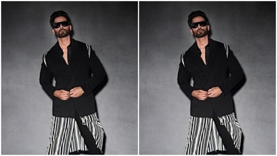 The shrug came with black blazer details on top, and waist down, silk kurta details in black and white.(Instagram/@shahidkapoor)