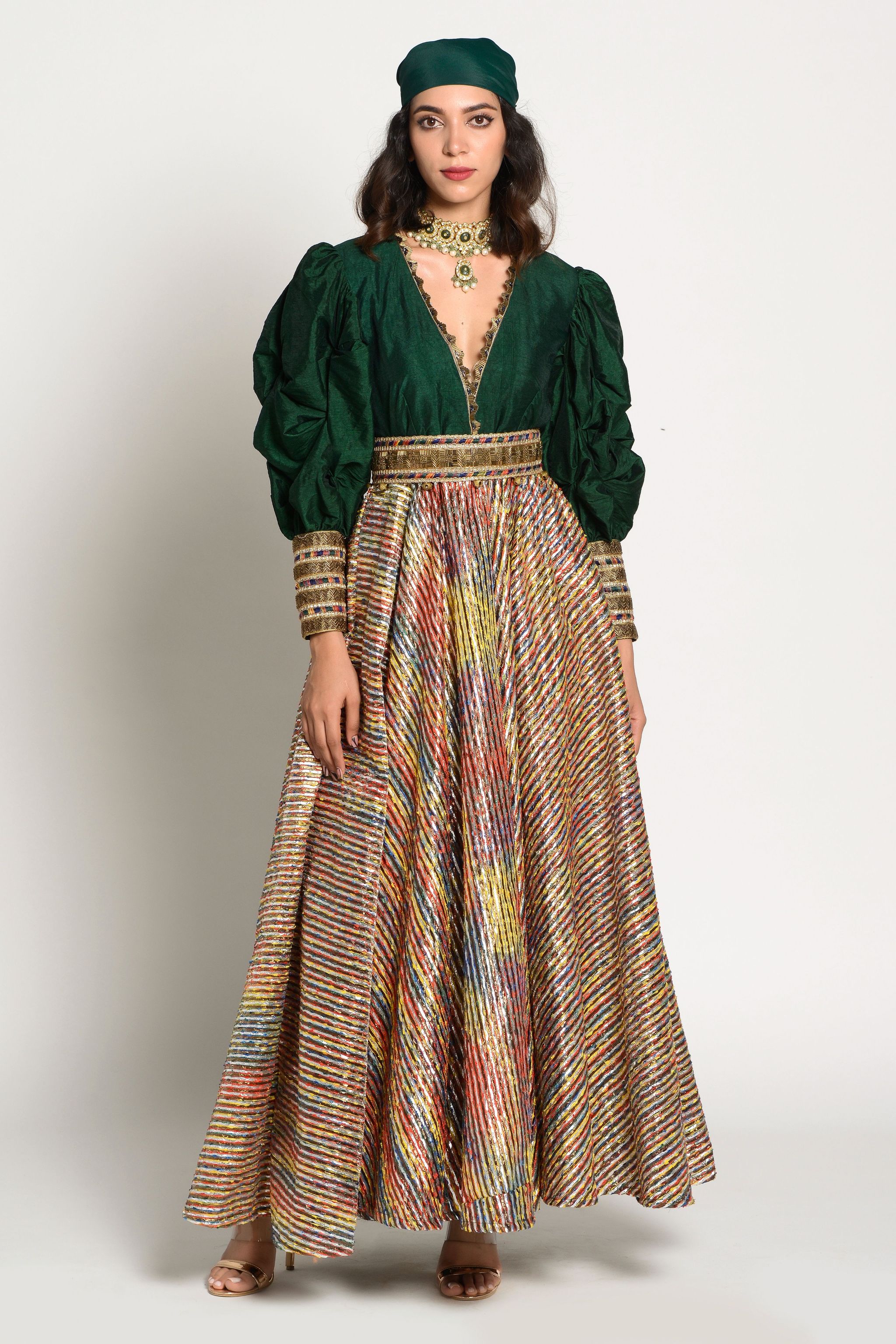 Dramatic sleeves and flares can help smooth out a silhouette. (Rishi and Vibhuti) Dramatic sleeves and flares can help smooth out a silhouette. (Rishi and Vibhuti)