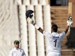 KL Rahul, right, raises his bet and a helmet after reaching a century during the Test Cricket match between South Africa India at Centurion Park in Pretoria, South Africa, Sunday(AP) KL Rahul, right, raises his bet and a helmet after reaching a century during the Test Cricket match between South Africa India at Centurion Park in Pretoria, South Africa, Sunday(AP)