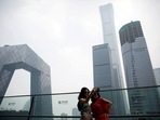 Women pose for pictures at a shopping mall near the CCTV headquarters and China Zun skyscraper in Beijing's central business district (CBD), China, July 16, 2020. (File Photo / REUTERS) Women pose for pictures at a shopping mall near the CCTV headquarters and China Zun skyscraper in Beijing's central business district (CBD), China, July 16, 2020. (File Photo / REUTERS)