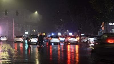 At Connaught Place, on Sunday. Between 5:30 pm and 8:30 pm, Safdarjung recorded 1.4mm of rainfall, while Palam received 0.2mm of rain. (Arvind Yadav/Hindustan Times) At Connaught Place, on Sunday. Between 5:30 pm and 8:30 pm, Safdarjung recorded 1.4mm of rainfall, while Palam received 0.2mm of rain. (Arvind Yadav/Hindustan Times)