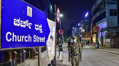 A deserted look of Bengaluru's Church Street during April's night curfew (PTI) A deserted look of Bengaluru's Church Street during April's night curfew (PTI)