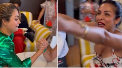 Malaika Arora and Amrita Arora do arm wrestling. (Instagram)