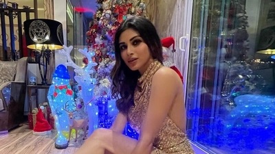Mouni Roy dazzles like a superstar in gold backless mini dress for Christmas bash Mouni Roy dazzles like a superstar in gold backless mini dress for Christmas bash