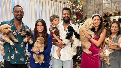 Hardik Pandya and Natasa Stankovic pose with their kid Agastya and their family. Hardik Pandya and Natasa Stankovic pose with their kid Agastya and their family.