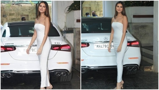 Tara attended the Christmas lunch wearing a strapless pristine white dress. It is from the label Club L London. The captivating ensemble comes in a stretch-jersey fabric featuring a plunging square neckline, contouring-fit accentuating her statuesque figure, back slit, and hem that hits just above the ankle.(HT Photo/Varinder Chawla)