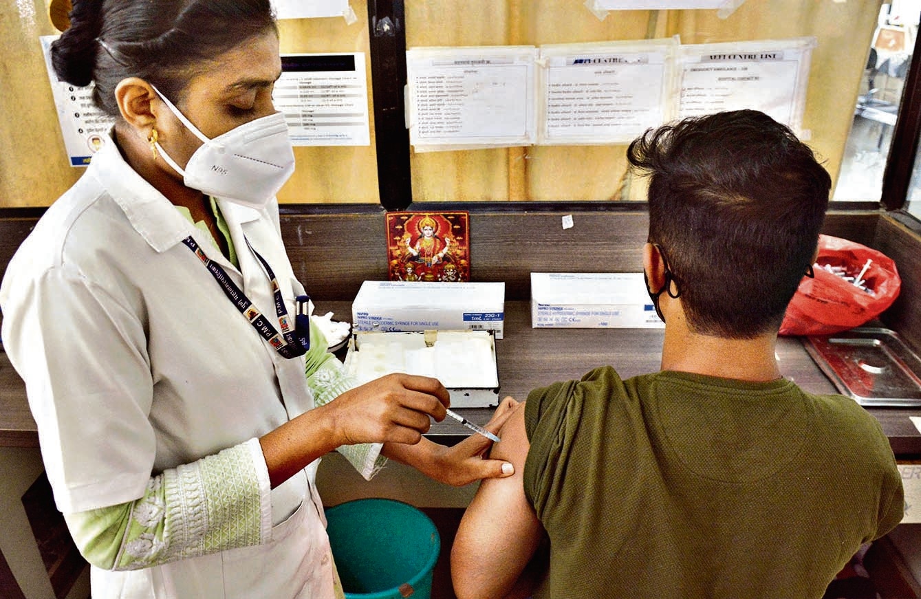 A beneficiary gets a vaccine dose at a hospital in Delhi.&nbsp; (HT Photo)