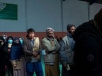 People wait in line to receive cash at a money distribution organized by the World Food Program (WFP) in Kabul, Afghanistan. People wait in line to receive cash at a money distribution organized by the World Food Program (WFP) in Kabul, Afghanistan.