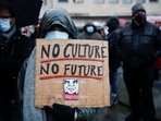 A woman holds a banner reading "No Culture, No Future" during a demonstration against the Belgian government's restrictions imposed to contain the spread of coronavirus disease (Covid-19) in Brussels, Belgium&nbsp;