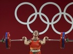 Mirabai Chanu reacts during a successful attempt in the 49 kg category of Women's Weightlifting event of the Summer Olympics 2020
