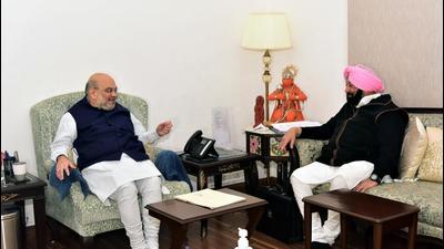 Punjab Lok Congress president and former CM Capt Amarinder Singh meets Union home minister Amit Shah, at his residence in New Delhi on Monday. (ANI) Punjab Lok Congress president and former CM Capt Amarinder Singh meets Union home minister Amit Shah, at his residence in New Delhi on Monday. (ANI)