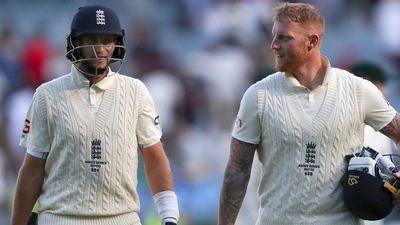 England's not out batsmen Joe Root, left, and Ben Stokes leave the field at stumps on the second day of their cricket test match against Australia in Melbourne, Australia. (AP) England's not out batsmen Joe Root, left, and Ben Stokes leave the field at stumps on the second day of their cricket test match against Australia in Melbourne, Australia. (AP)