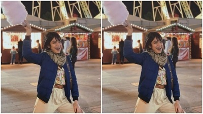 In a floral white shirt and an ivory white pair of trousers, Sobhita had the most fun in the fair ground. (Instagram/@sobhitad)