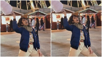 She layered her look with a blue jacket and a grey and black woollen scarf, added more winter vibes to her picture. (Instagram/@sobhitad)