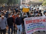 Resident doctors held a protest march in New Delhi against the repeated postponement of the NEET-PG 2021 counselling. Resident doctors held a protest march in New Delhi against the repeated postponement of the NEET-PG 2021 counselling.