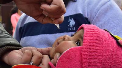 A health worker administers polio vaccine drops to a child during a national Pulse Polio Immunisation (PPI) programme at a Urban Primary Health Centre at Heritage street in August 2021. (HT File Photo/Sameer Sehgal) A health worker administers polio vaccine drops to a child during a national Pulse Polio Immunisation (PPI) programme at a Urban Primary Health Centre at Heritage street in August 2021. (HT File Photo/Sameer Sehgal)