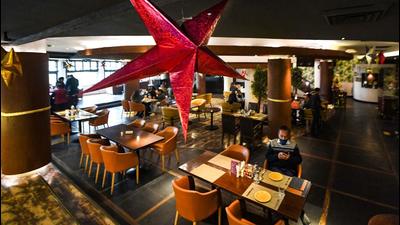 Delhi’s restaurant owners said curtailment of timings will cause a huge dent in earnings. (PTI) Delhi’s restaurant owners said curtailment of timings will cause a huge dent in earnings. (PTI)