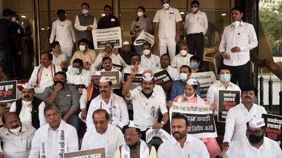 Several legislators protest over various issues at the entrance of the Maharashtra legislative assembly in Mumbai on Monday. (Satish Bate/ HT photo)